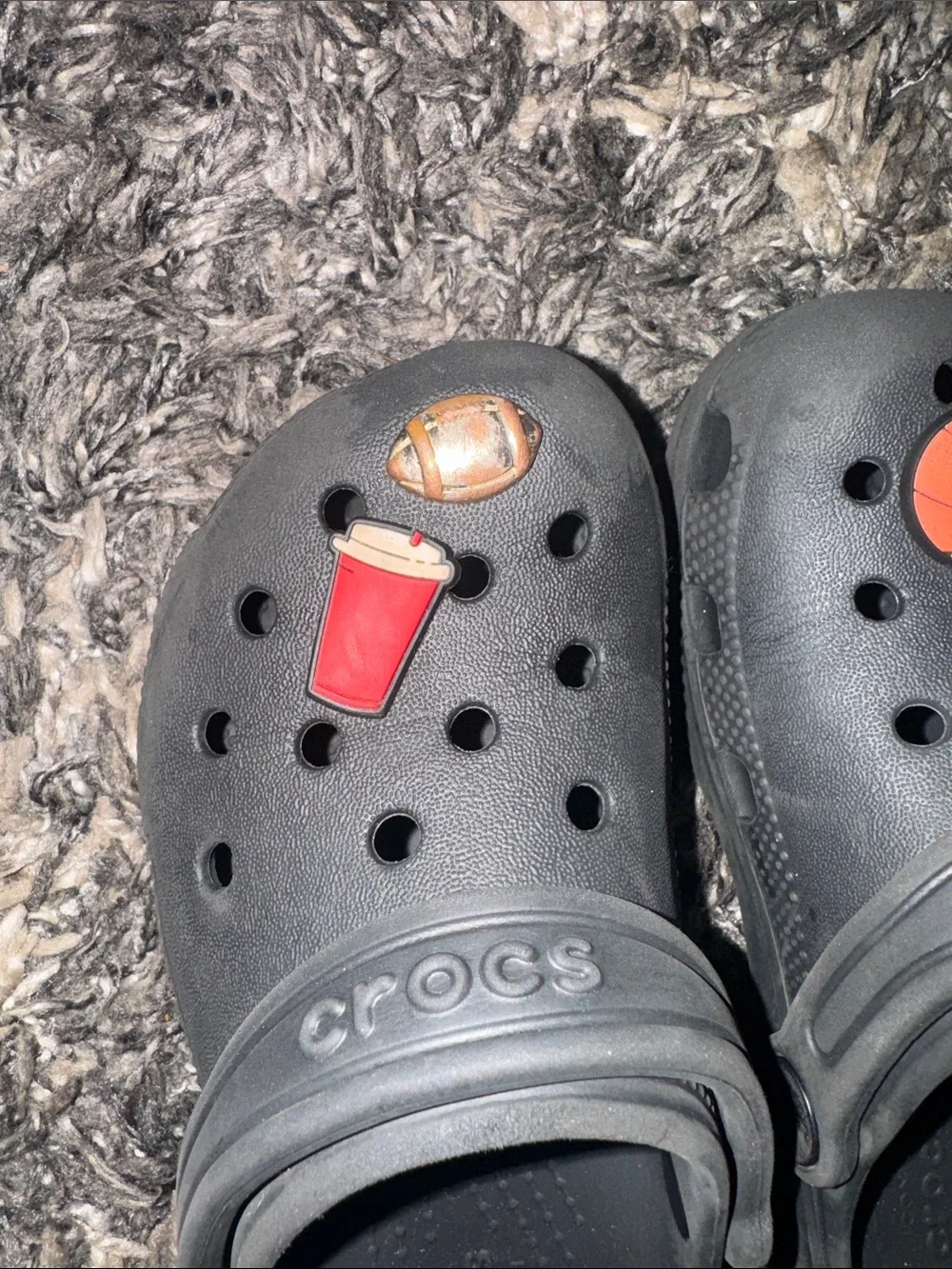 CROCS Kids Black Clogs with Sports Jibbitz